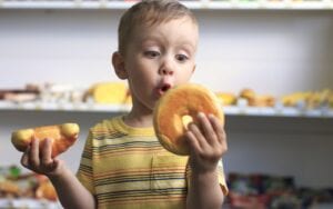 Child looking at Bagel excitedly