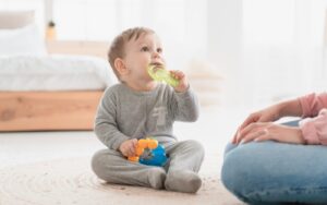 Child with chew toy