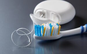Floss and Toothbrush Up Close