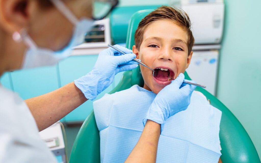 Child seeing a pediatric dentist