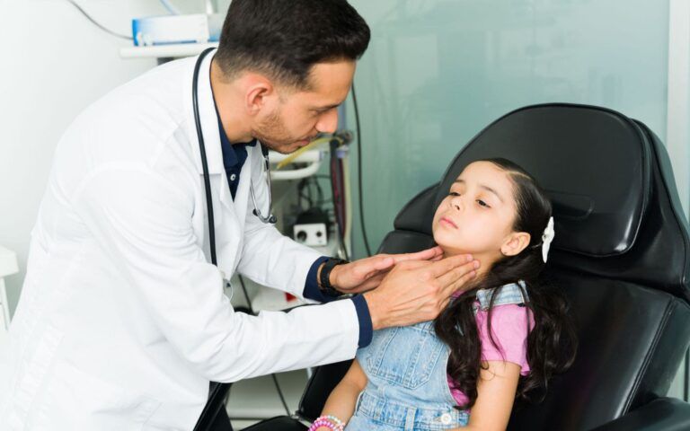 Child Recieving Inspection for Sore Throat